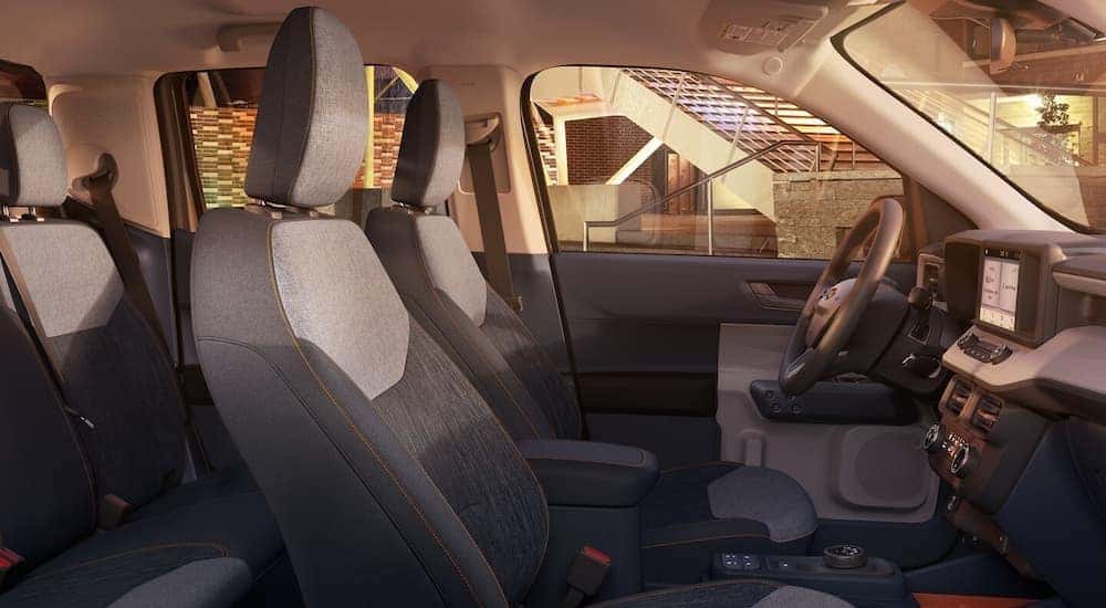 The gray interior and dash in a 2023 Ford Maverick is shown.