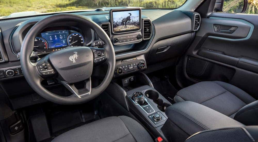 The interior of a 2022 Ford Bronco Sport is shown from the drivers seat.