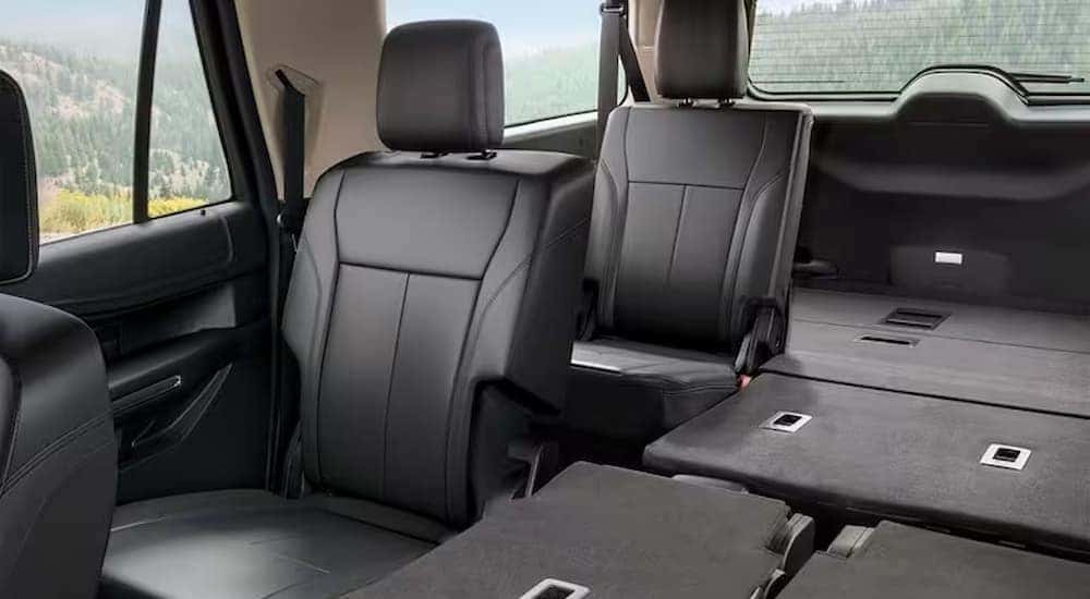 The black interior is shown in a 2024 Ford Expedition XLT MAX.