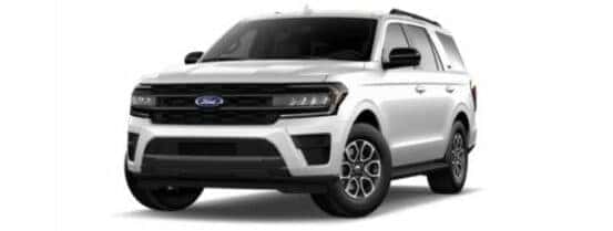 A white 2024 Ford Expedition is angled left.