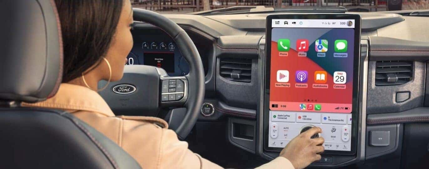 A close-up of the infotainment screen is shown in a 2024 Ford Expedition.