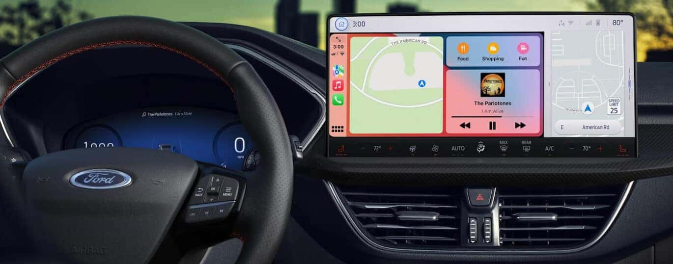 The steering wheel and large infotainment screen in a 2025 Ford Escape.