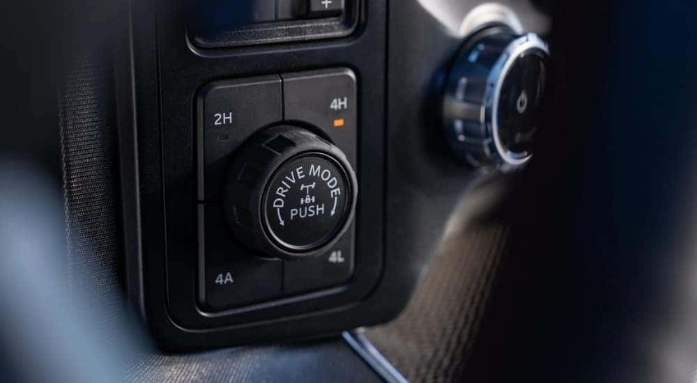 A close up shows the drive mode dial in a 2025 Ford F-150.