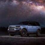 A blue 2022 Ford Bronco Sport is shown from the side after leaving a dealer that has a used Ford Bronco Sport for sale.