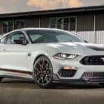 A grey 2021 Ford Mustang Mach 1 is shown from the front at an angle after leaving a used Ford for sale near Schenectady.