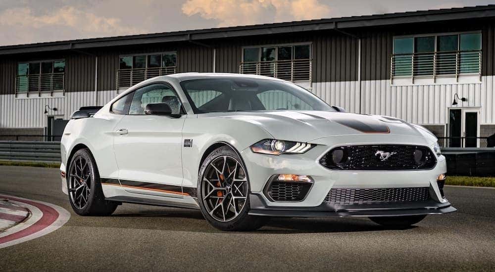 A grey 2021 Ford Mustang Mach 1 is shown from the front at an angle after leaving a used Ford for sale near Schenectady.