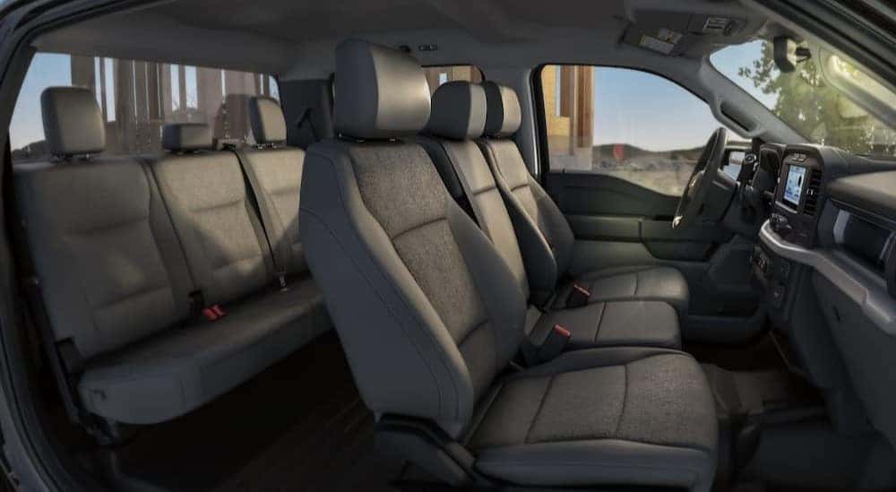 The gray interior is shown in a 2023 Ford F-150 Lariat.