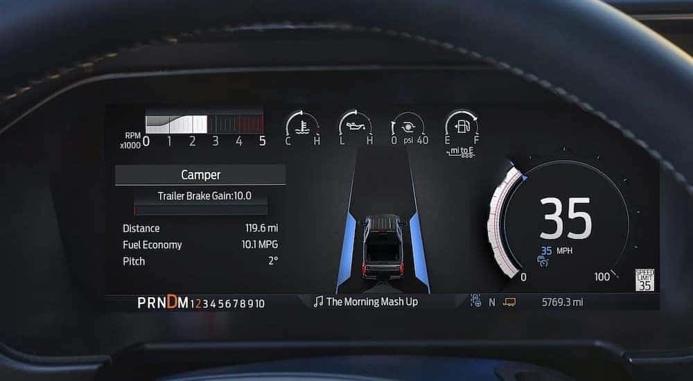 A close-up of the digital dash is shown in a 2025 Ford F-350.