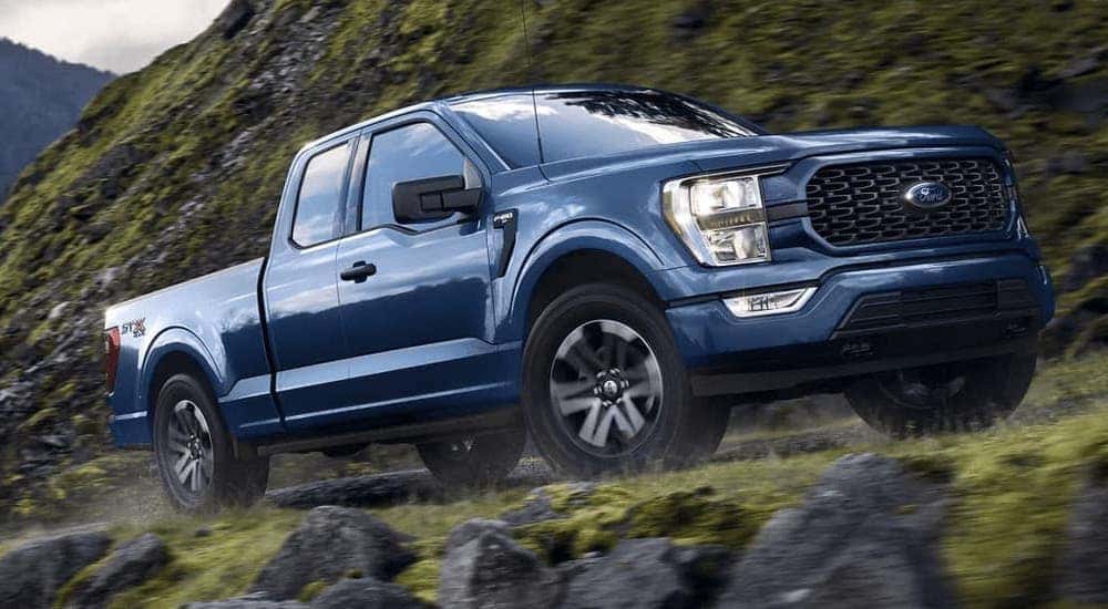 2023 Ford F-150 STX is shown from the side after leaving a dealer that has a used Ford F-150 for sale near Delmar.