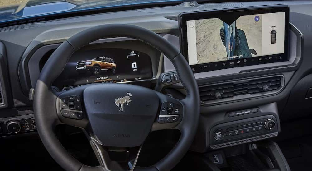 A close-up of the black dash is shown in a 2025 Ford Bronco Sport.