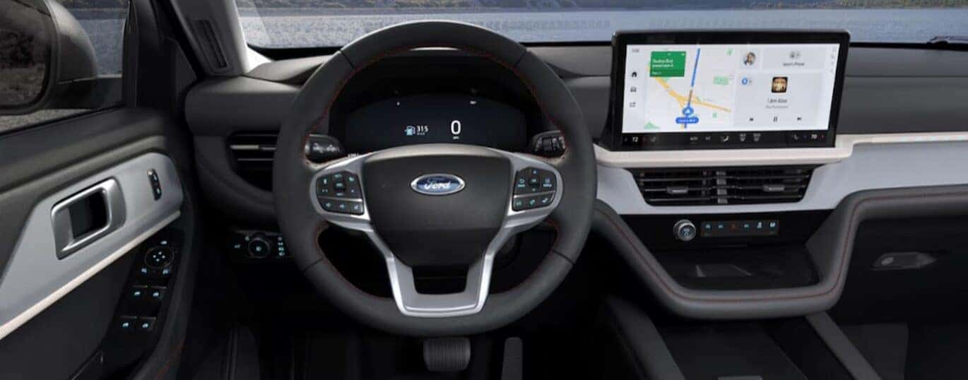The black and gray interior and dash are shown in a 2025 Ford Explorer Active.