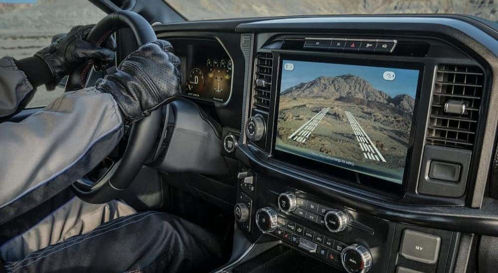 The black dash is shown in a 2025 Ford F-150.