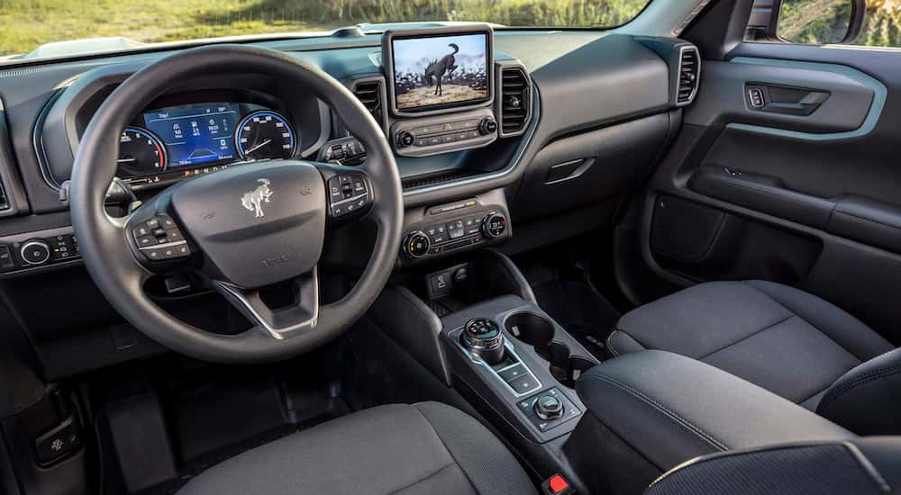 The black interior of a 2024 Ford Bronco Sport is shown.