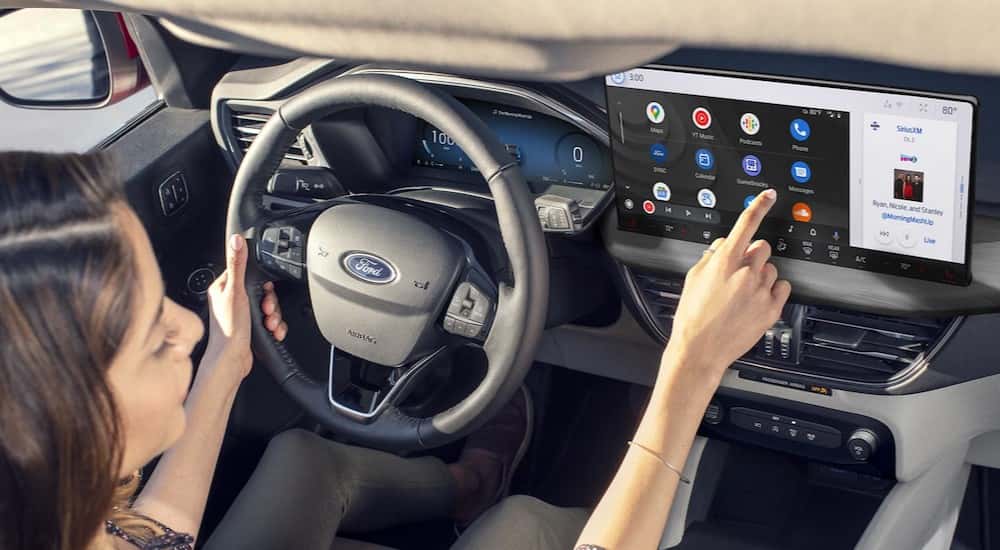 The gray interior and dash are shown in a 2025 Ford Escape PHEV.