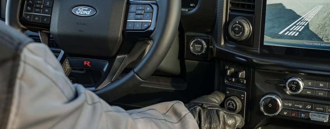 The black dash is shown in a 2024 Ford F-150 Raptor.