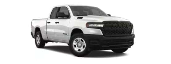 A white 2025 Ram 1500 Tradesman is angled right.