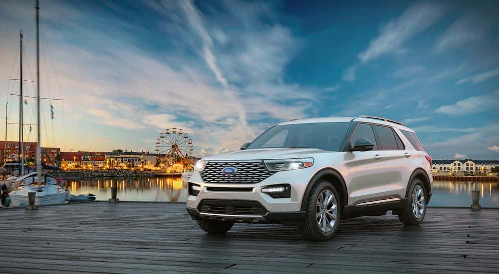 A white 2021 Ford Explorer is shown from the front at an angle.