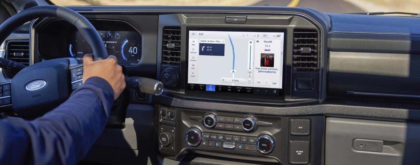 The infotainment screen and black interior in a 2025 Ford F-350.