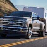 A grey 2025 Ford F-350 is shown from the front at an angle.