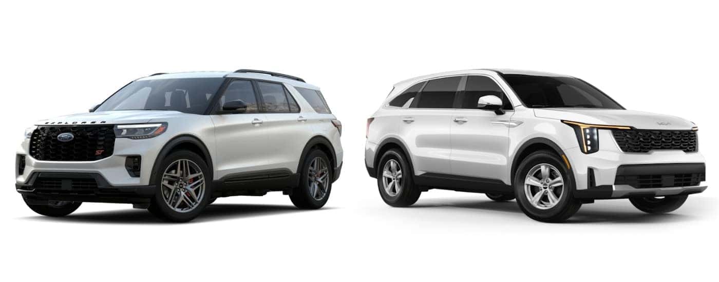 A white 2025 Ford Explorer ST facing left and a white 2025 Kia Sorento LX facing right.