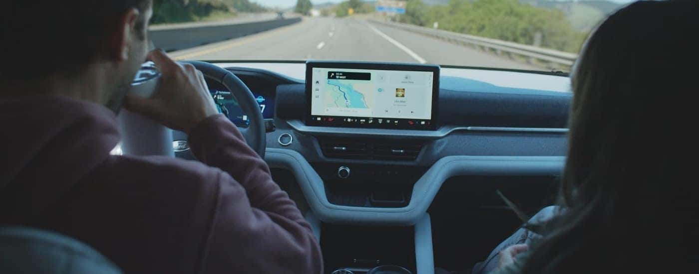 People driving in a 2025 Ford Explorer.