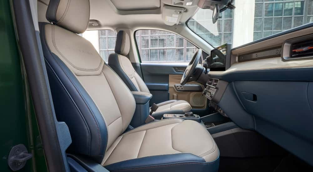 The brown interior of a 2025 Ford Maverick from the passenger side.