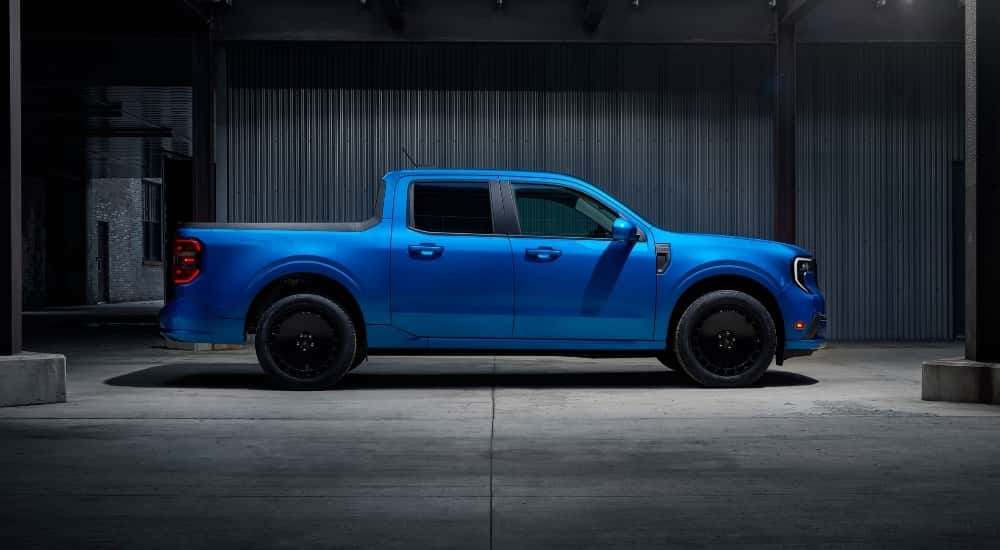 A blue 2025 Ford Maverick for sale from the side.