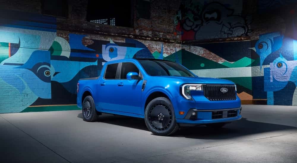 A blue 2025 Ford Maverick from the front at an angle.