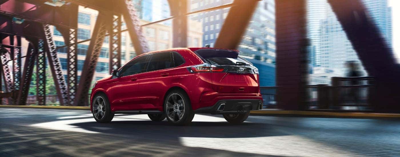 A red 2021 Ford Edge for sale in Albany from the rear.