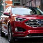 A red 2019 used Ford Edge for sale in Albany from the front.