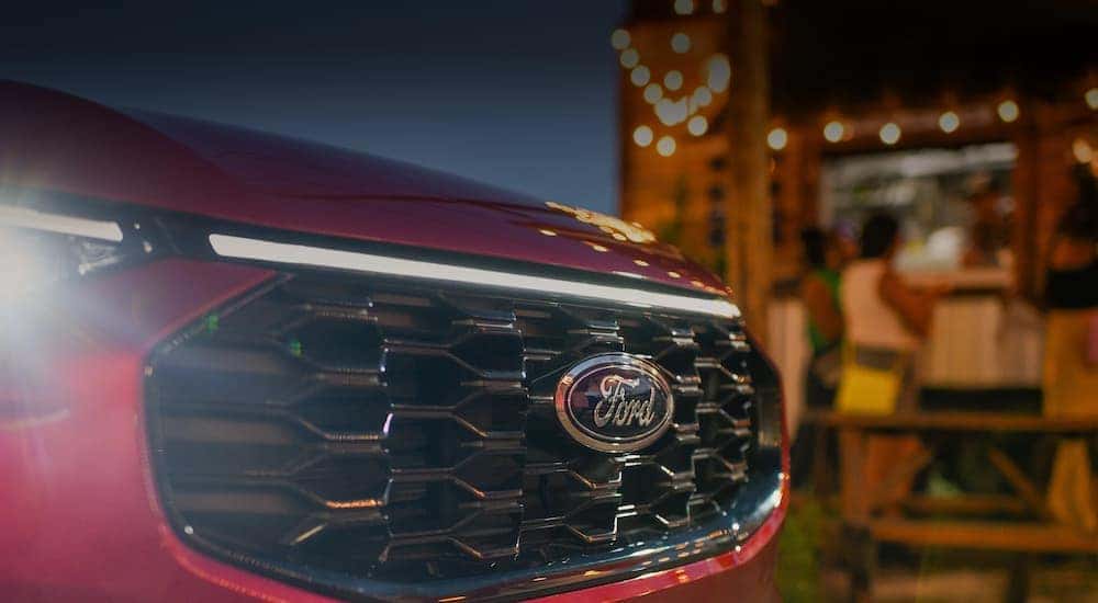 Front grille of a red 2025 Ford Escape
