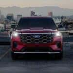Red 2025 Ford Explorer parked on a rooftop.