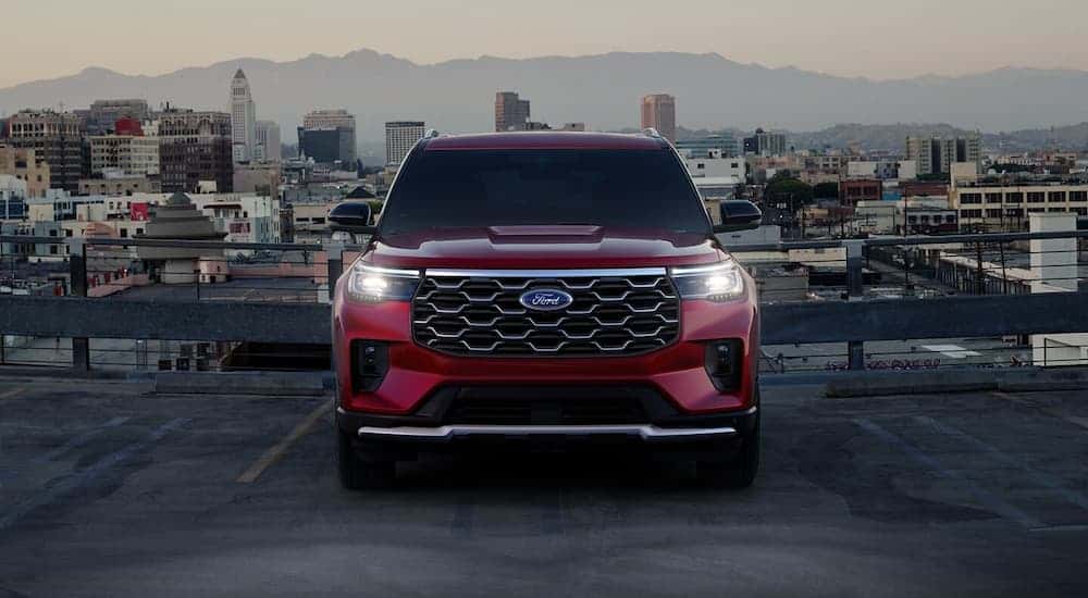 Red 2025 Ford Explorer parked on a rooftop.
