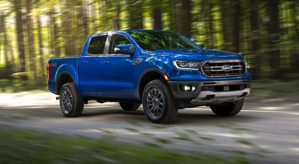 A blue 2019 Ford Ranger from the side after leaving a dealer that has used trucks for sale near Latham.