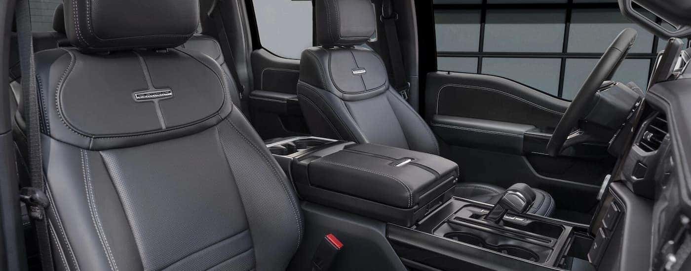 Black leather interior of a 2025 Ford F-150 Lightning Dark Elements Package