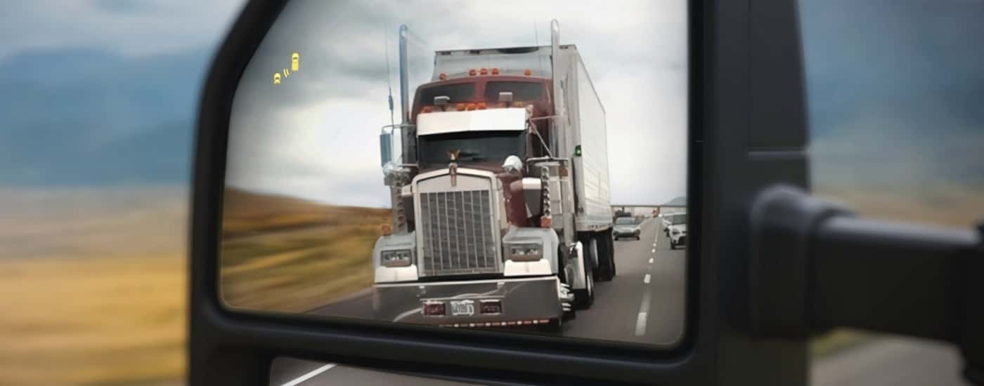 Blind spot monitoring icon on a 2025 Ford F-250 Lariat.