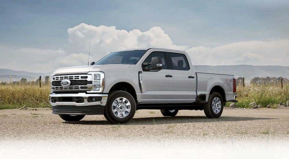 A white 2025 Ford F-250 parked during the day.