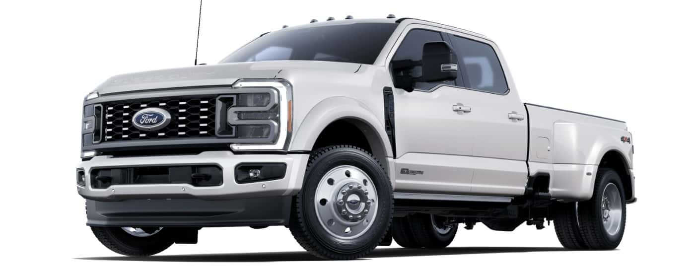 A white 2025 Ford F-450 Platinum angled left.