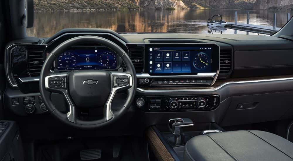 Infotainment and digital gauge cluster on a used 2023 Chevy Silverado 1500 trucks for sale near Delmar