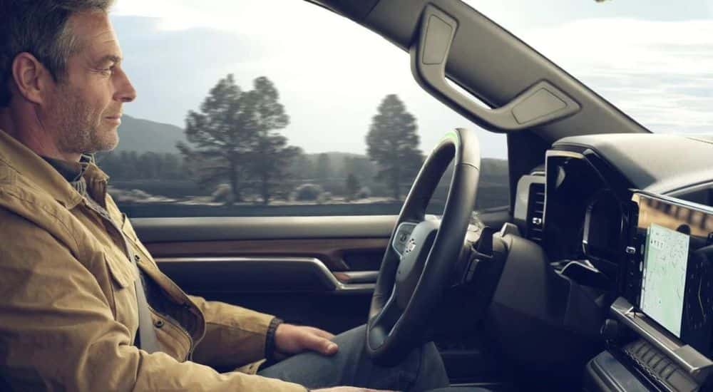 A man using SuperCruise in a used 2024 Chevy Silverado 1500