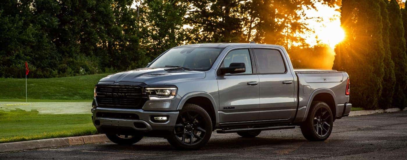 Silver 2022 Ram 1500 parked near grass