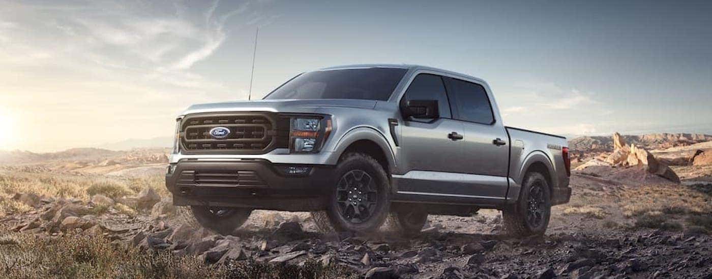 A silver 2023 Ford F-150 from the front at an angle.
