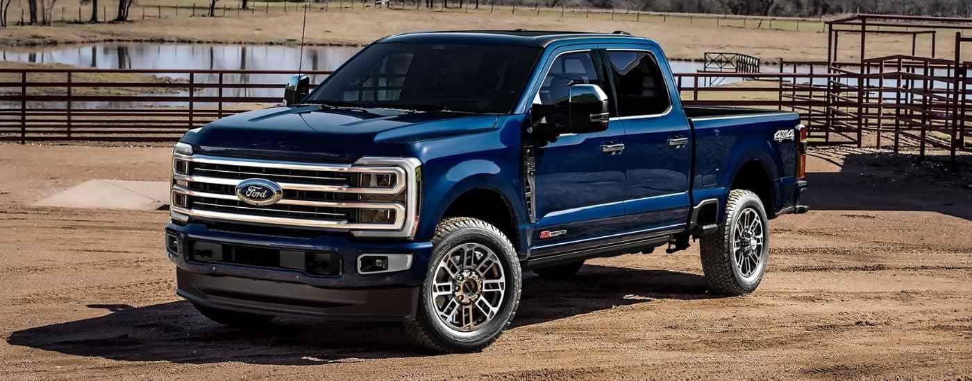 Blue 2025 Ford F-350 parked on a farm