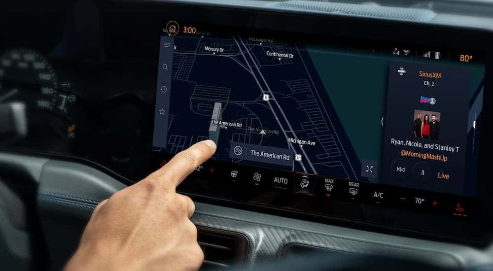 Infotainment and digital gauge cluster on a 2026 Ford Mustang