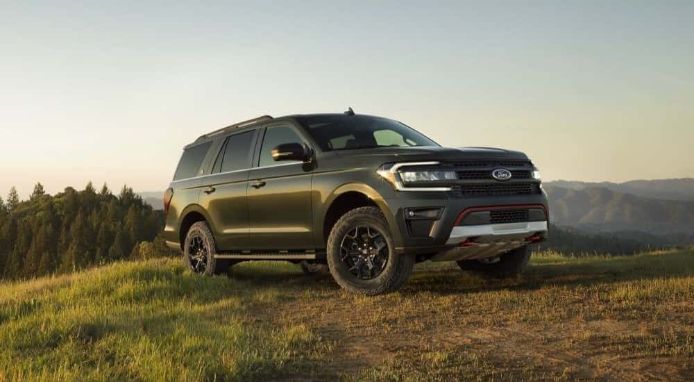 Black 2023 Ford Expedition parked off-road.
