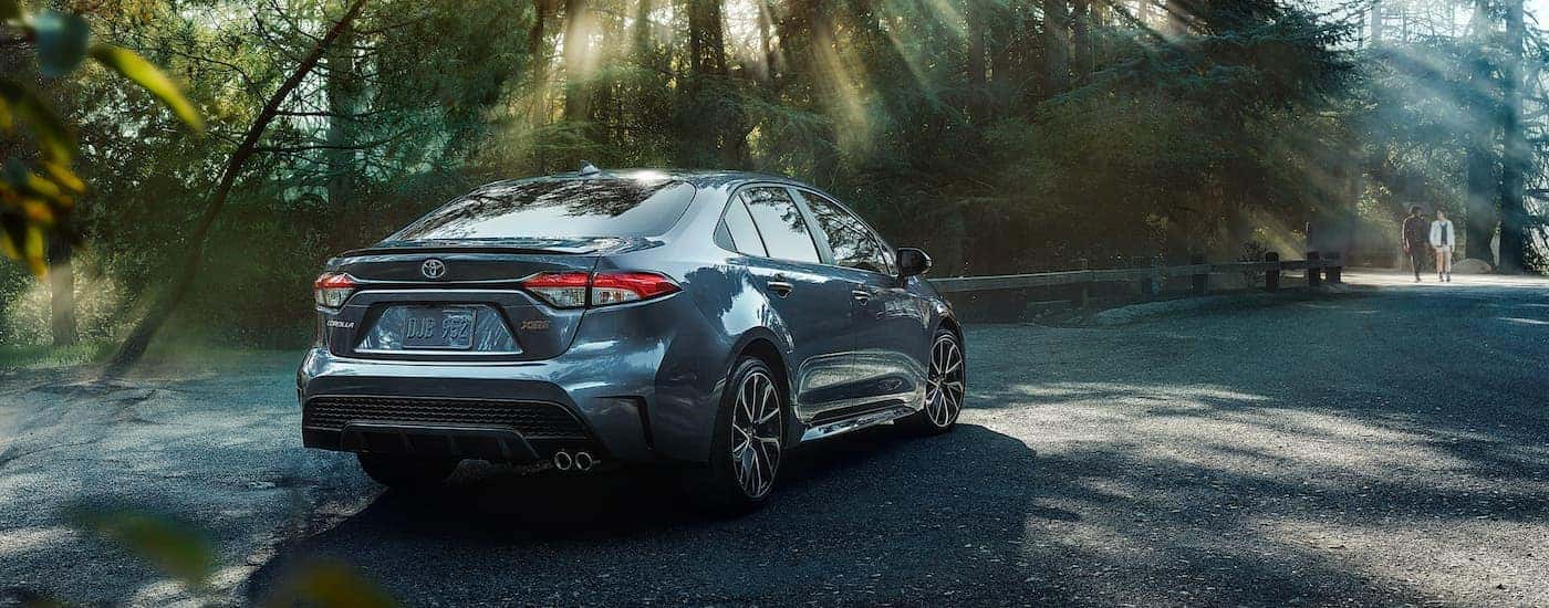Rear of a grey 2020 Toyota Corolla XSE parked on a road after visiting a dealer with a used cars for sale near East Greenbush.