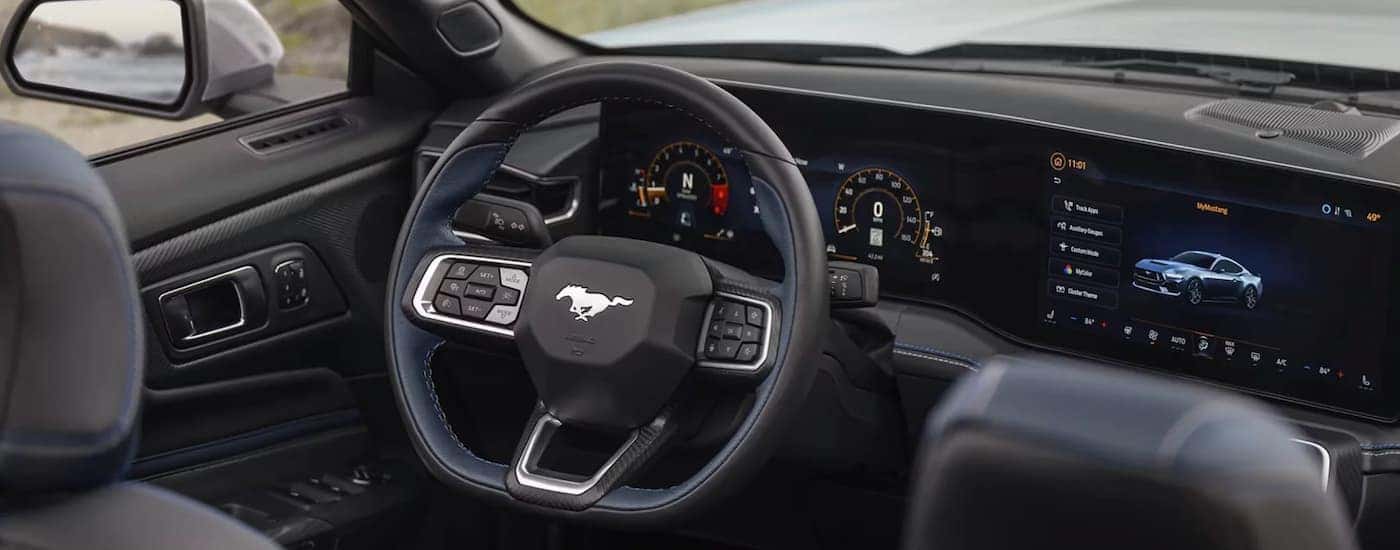 Infotainment and digital gauge cluster on a 2026 Ford Mustang