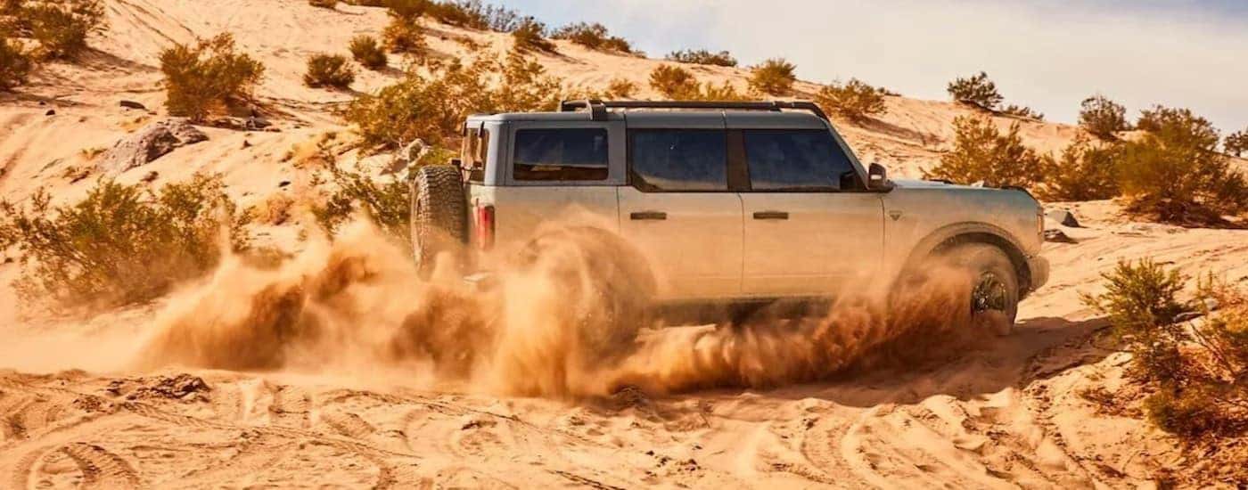 A silver 2022 Ford Bronco from the side.