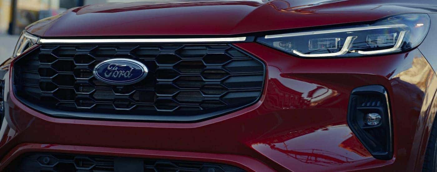Front grille of a red 2025 Ford Escape