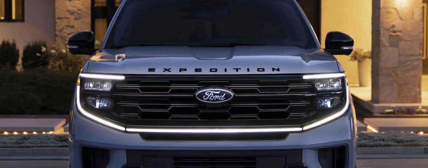 Front grille on a gray 2025 Ford Expedition parked